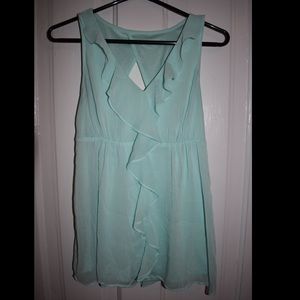 Teal low cut tank with frills around neck
